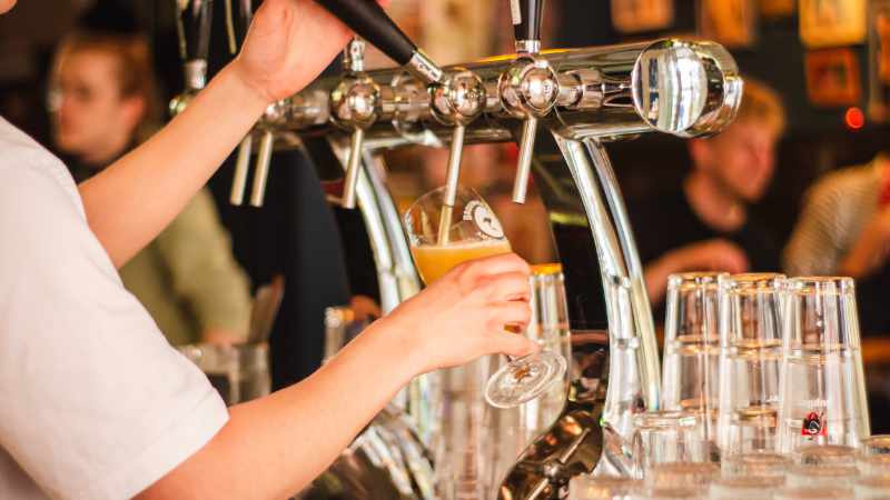 Beer pouring into glass.